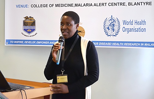 Photo shows Atupele talking into a microphone
