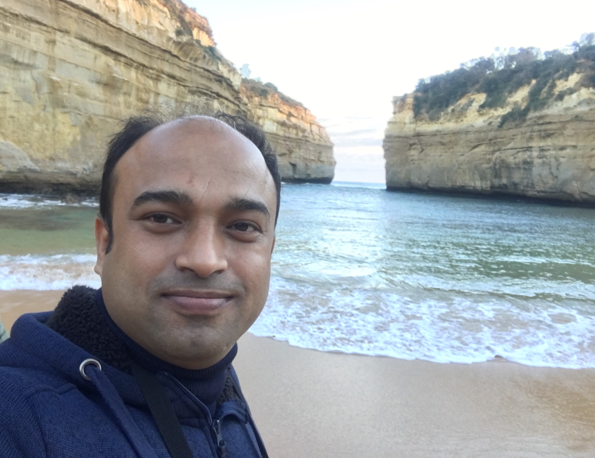 Profile image of Mohammad with a beach and cliffs in the background