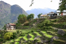 Image shows the countryside with dwellings