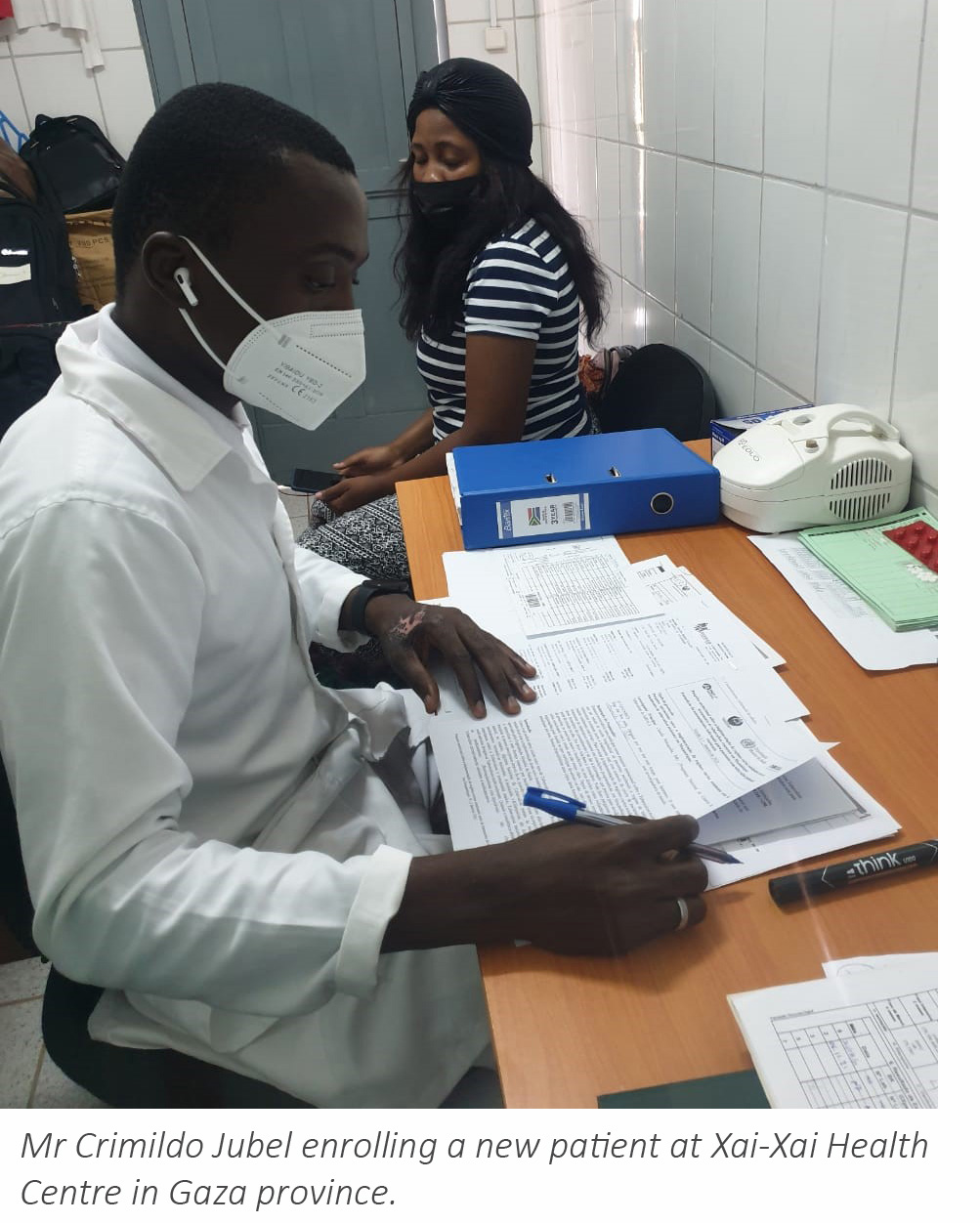 Mr Crimildo Jubel enrolling a new patient at Xai-Xai Health Centre in Gaza province.